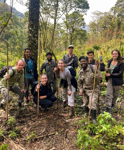 Image of a group of travellers on a gorilla trek in Uganda - KILROY